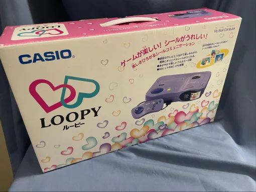 The Dawn of Girls' Games: Part 3 is "Loopy". Review of a phantom "game machine for girls" with only 11 software and stickers printed